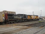 SP 343 UP 5957  1Apr2011  EB with empty coal cars approaching the yard office 